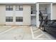 Exterior shot showing parking and unit access to building with stairs on multi-level at 3102 W Horatio St # 13, Tampa, FL 33609