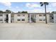 Two-story condominium building with stairs to the second floor and a parking area at 3102 W Horatio St # 13, Tampa, FL 33609