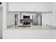 Kitchen with stainless steel appliances, granite counters, and white cabinets at 3102 W Horatio St # 13, Tampa, FL 33609