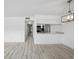 Open floorplan showing view into the kitchen area and light flooring at 3102 W Horatio St # 13, Tampa, FL 33609