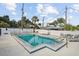 Community pool featuring an inset spa with lounge chairs nearby at 3102 W Horatio St # 13, Tampa, FL 33609