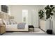 Bedroom features a cozy bed with stylish decor, adjacent to a closet and a tasteful dresser, offering ample storage at 31596 Griffin Sands Ln, San Antonio, FL 33576