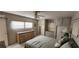 Bedroom featuring a queen-sized bed, built-in storage, and natural light from the windows at 3301 Alt 19 # 500, Palm Harbor, FL 34683