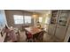 Bright dining area with views and classic furnishings at 3301 Alt 19 # 500, Palm Harbor, FL 34683