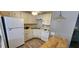Functional kitchen includes classic appliances and ample cabinet space at 3301 Alt 19 # 500, Palm Harbor, FL 34683