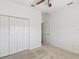 Bright bedroom has a closet and a ceiling fan at 3311 Stonebridge Trl, Valrico, FL 33596