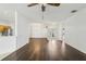Bright living room features hardwood floors, fresh paint, and lots of natural light at 3311 Stonebridge Trl, Valrico, FL 33596