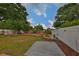Spacious backyard featuring a deck and lush greenery at 3411 W Beach St, Tampa, FL 33607