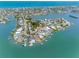 An aerial view of the waterfront community, highlighting the house's prime location near the water at 366 12Th Ave, Indian Rocks Beach, FL 33785