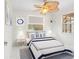 Bright bedroom with a comfortable bed, stylish bedside tables, and ample natural light for a serene and inviting atmosphere at 366 12Th Ave, Indian Rocks Beach, FL 33785