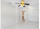 Bright bedroom with white walls, tile flooring, closet and an ensuite bathroom at 366 12Th Ave, Indian Rocks Beach, FL 33785