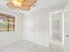 Bright bedroom with white walls, and white marble-patterned tile flooring at 366 12Th Ave, Indian Rocks Beach, FL 33785