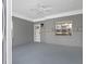 View of the screened porch showing the neutral color scheme at 366 12Th Ave, Indian Rocks Beach, FL 33785