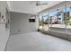 Neutral colored screened porch with view to the street at 366 12Th Ave, Indian Rocks Beach, FL 33785
