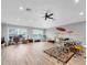 Expansive bonus room with plenty of space for recreation and features a ceiling fan at 3716 Janus Way, Palm Harbor, FL 34685