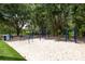 Outdoor fitness area with various exercise stations surrounded by trees at 3716 Janus Way, Palm Harbor, FL 34685