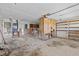 Spacious garage with built-in shelving and a utility sink at 4274 Deleon Dr, Hernando Beach, FL 34607