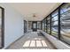 Enclosed lanai with walls of windows offers water views and natural light at 4274 Deleon Dr, Hernando Beach, FL 34607