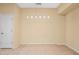 Dining area featuring a modern light fixture and neutral walls with tile flooring at 4528 Amberly Oaks Ct, Tampa, FL 33614