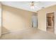 Spacious carpeted primary bedroom with ensuite bathroom and walk-in closet at 4528 Amberly Oaks Ct, Tampa, FL 33614