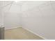 Walk-in closet with white wire shelving at 4528 Amberly Oaks Ct, Tampa, FL 33614