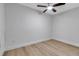 Neutral bedroom features ceiling fan and light colored floors at 4624 83Rd Terrace N, Pinellas Park, FL 33781