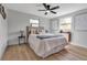 Stylish bedroom features a comfortable bed, ample natural light, and modern decor at 4624 83Rd Terrace N, Pinellas Park, FL 33781