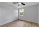 Bright bedroom with a ceiling fan and closet featuring natural light from the window at 4624 83Rd Terrace N, Pinellas Park, FL 33781