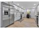Modern kitchen boasts stainless steel appliances, white cabinetry, and a stylish backsplash, perfect for culinary enthusiasts at 4624 83Rd Terrace N, Pinellas Park, FL 33781