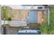 Aerial view of the property showing the yard, roof, driveway, and property lines at 4714 W Lawn Ave, Tampa, FL 33611