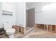 Bathroom with toilet and tiled shower, featuring open walls at 4714 W Lawn Ave, Tampa, FL 33611