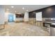 Bright kitchen awaiting remodel with a stainless steel range oven at 4714 W Lawn Ave, Tampa, FL 33611