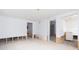 Large room with a doorway leading to a bathroom and ample space at 4714 W Lawn Ave, Tampa, FL 33611