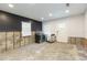 Bright room awaiting remodel with a stainless steel range oven at 4714 W Lawn Ave, Tampa, FL 33611