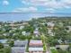 Breathtaking aerial shot of a waterfront neighborhood with stunning bay views, showcasing the community's coastal charm and beauty at 5015 S Elberon St, Tampa, FL 33611