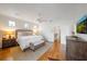 Spacious bedroom features hardwood floors, natural light, and neutral decor at 5015 S Elberon St, Tampa, FL 33611