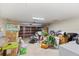 Spacious two-car garage with room for storage or a workshop area at 5213 Burr Pl, Seffner, FL 33584