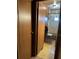 Small bathroom featuring bathtub and wooden paneling on wall at 6099 107Th N Ave, Pinellas Park, FL 33782