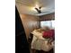 Bedroom features a ceiling fan and a large closet, offering storage solutions and comfort at 6099 107Th N Ave, Pinellas Park, FL 33782