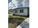 Cozy single-story home featuring a well-manicured lawn, offering a peaceful and inviting curb appeal at 6099 107Th N Ave, Pinellas Park, FL 33782