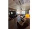 Open living area with entertainment center and dining space at 6099 107Th N Ave, Pinellas Park, FL 33782