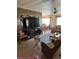 Spacious living area flows into the dining room, illuminated by natural light at 6099 107Th N Ave, Pinellas Park, FL 33782