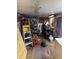 A cluttered shed featuring tools, shelving, and various equipment, providing storage and workspace at 6099 107Th N Ave, Pinellas Park, FL 33782