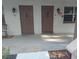Inviting condo entrances featuring private door with a step; each unit is well-lit with exterior lighting at 650 Pinellas Point S Dr # 101, St Petersburg, FL 33705