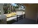 View of backyard with fenced yard and garage with white doors at 7013 N 15Th St, Tampa, FL 33610