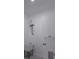 This laundry room has a utility sink, cabinets, and modern appliances at 7013 N 15Th St, Tampa, FL 33610