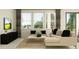 Comfortable living room with plush seating, decorative pillows, modern decor, and natural lighting at 7545 E 116Th St, Palmetto, FL 34221