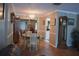Classic dining area with a chandelier and view of an office space, showcasing a traditional design at 9639 Mainlands E Blvd, Pinellas Park, FL 33782