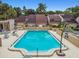Relaxing community pool with lounge chairs, inviting residents to relax and soak up the sun at 4222 Hartwood Ln # 1202, Tampa, FL 33618