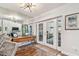 Bright dining area with seamless indoor-outdoor transition through French doors leading to the backyard at 4222 Hartwood Ln # 1202, Tampa, FL 33618
